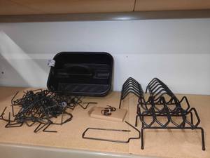 lot 1687 image: Lot of metal firearm holders and one utility caddy.