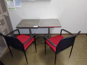 lot 1759 image: (2) Aluminum Tables supported by a cross base, features a sleek chrome finish (2) Red Side Arm Chairs.