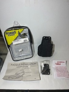 lot 1307 image: Pegasus by Desantis Holsters  CAZZUTO (right) for Glock 45