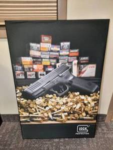 lot 1861 image: Merchandising Frame with Glock Graphic