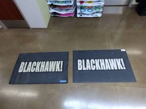 lot 1873 image: (2) Floor Mats Blackhawk Super scrape Impression, back smooth. Measure 3 x 5