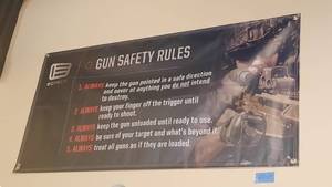 lot 1875 image: (3) Vinyl Banners, Gun Safety measures 48 x 24 Ruger measures 58 x 24 Real Avid measures 72 x 36
