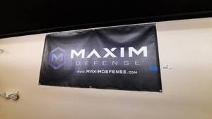 lot 1882 image: Vinyl Banner Maxim measures 72 x 36