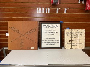 lot 1924 image: MPCUT-6 composite cutting board, Framed We the people... Wall sign This house is protected...