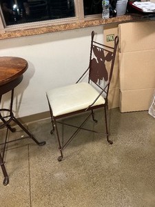 lot 1930 image: Round table with Rod Iron base. 2 Chairs, one with a Moose back and one with a Bear back
