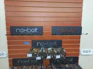 lot 1953 image: (5) NexBelt Display Fixtures, Measures20.75  Wide. NOTE Product not included.