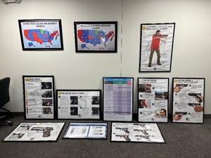 lot 1749 image: (7) USCCA Posters, framed. (4) Firearm-related Posters, framed.