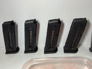 lot 1791 image: (4) Glock .22LR Magazines 10 RD. (2) Magazines. Orange Dummy Rounds