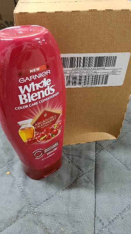 lot 202 image: W Box of 4 Garnier Whole Blends Cranberry and Argan Oil Conditioner