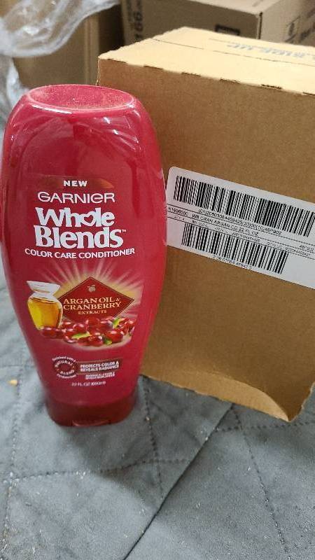 lot 203 image: W Box of 4 Garnier Whole Blends Cranberry and Argan Oil Conditioner