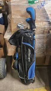 lot 8 image: Dunlap Golf bag with assorted gold clubs