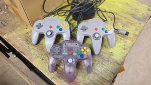 lot 36 image: 3 Nintendo 64 Controller and N64 Power Adapter