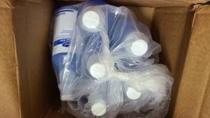 lot 52 image: Brand new bottles of Glance RTU Glass and Multisurface Cleaner
