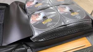 lot 83 image: Large Binder full of Classic TV show DVDs SEE PICTURES
