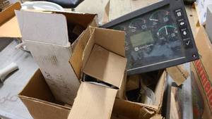 lot 111 image: Box of John Deer Parts and electronics