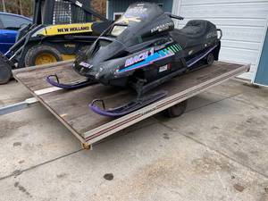 lot 4 image: LoadMaster Tilt 2-Place Snowmobile Trailer