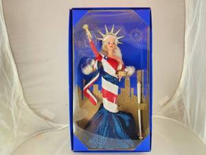 lot 235 image: NIB Statue of Liberty Barbie
