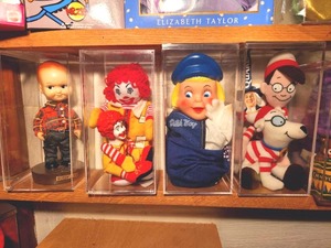 lot 145 image: Branded 4 Pc. Plush  Doll