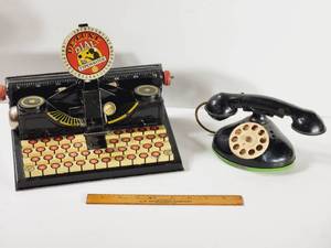 lot 385 image: Vintage Tin Toys, De-luxe Dial Typewriter & Rotary Phone