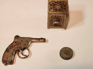 lot 447 image: Antique Cap Gun, Star Safe & Saving Bank