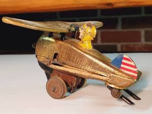 lot 448 image: Vintage Marx Tin Litho Windup Toy Plane