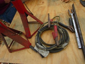 Jack stands, jumper cables, tie rod...