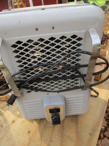 Titan milkhouse heater, working...