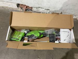lot 29 image: Greenworks 48V 16 Brushless Cordless String Trimmer