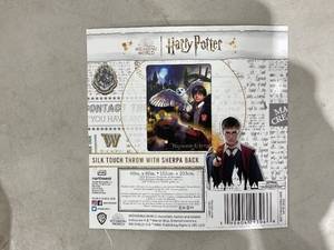 lot 363 image: Harry Potter Magic Montage Silk Touch Sherpa Throw