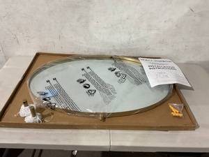 lot 81 image: Brushed Gold Oval Pivot Mirror