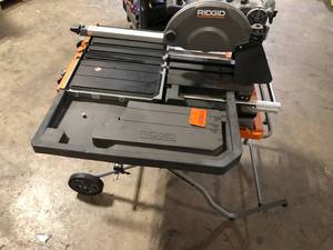 RIDGID 15 Amp 10 in. Wet Tile Saw with Portable Stand  Customer Returns See Pictures