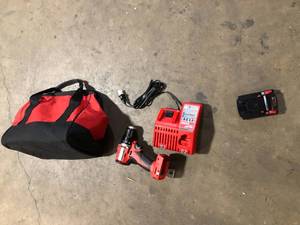 Milwaukee Drill , Battery and Charger Customer Returns See Pictures