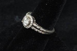 lot 26 image: Sterling Silver Ladies Halo Style Ring