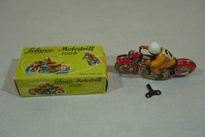 lot 69 image: Vintage Schuco Motodrill 1006 Windup Tin Toy Motorcycle with Key and Original Box