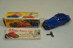 lot 70 image: Vintage Schuco Magico Auto 2008 Windup Tin Toy Car with Key and Original Box