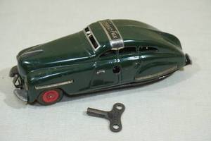lot 74 image: Vintage Schuco Fex 1111 Tin Windup Toy Car with Key