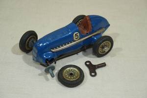 lot 75 image: Vintage Schuco Studio 1050 Tin Windup Toy Car with Key