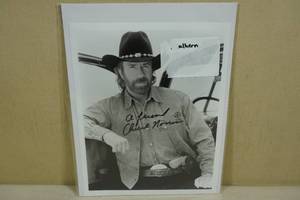 lot 134 image: Signed Chuck Norris Photograph