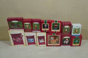 lot 226 image: 13 Vintage Hallmark Keepsake Christmas Ornaments -Lionel Steam Locomotive, Crayola Crew Chief