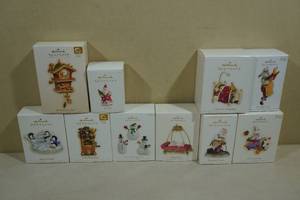 lot 249 image: 10 Vintage Hallmark Keepsake Christmas Ornaments -Workshop Clock, St Nick, Teddy Bear Band, Santa