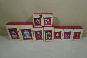 lot 250 image: 9 Vintage Hallmark Keepsake Christmas Ornaments -Santa Hula-Day, Music and Lights House, Christmas Time in the City