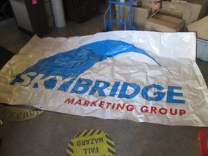 (EW6) Large Tarp Like Sign with Grommets Approx 5 ft x 9 ft