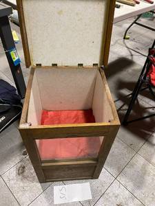 Cabinet with hinged top