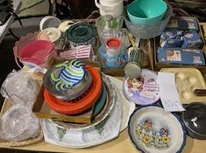 Table full of kitchen and dining wares