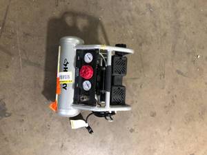 Husky 1 Gal. Portable Electric-Powered Silent Air Compressor    Customer Returns See Pictures