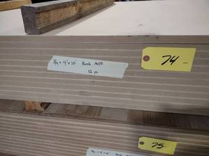 lot 74 image: (12) 34x4x10 Birch MDF...