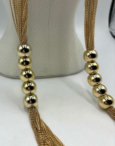lot 45 image: Multi- Strand Gold Tone Necklace