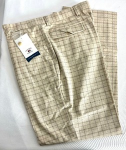 lot 114 image: 4 Pairs of Cutter & Buck Pants