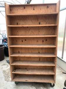 lot 32 image: Two Double-sided Wood Shelves on Casters