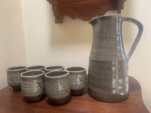 lot 95 image: Art Stoneware Tall Pitcher and Six  1 drinking glasses